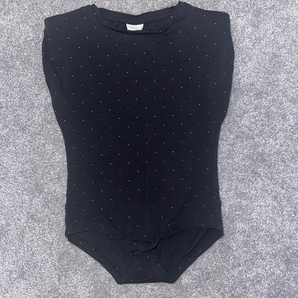 Girls Zara bodysuit w mini studs. Bottom clasps and shoulder pads. Size 7